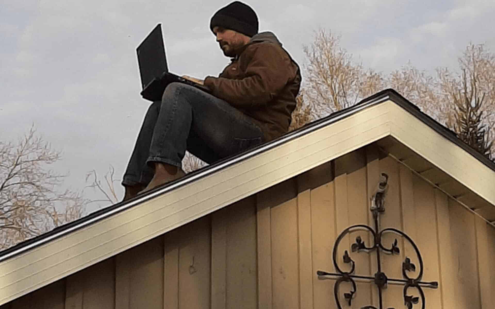 Scott works remotely from his roof